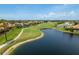 Scenic water view overlooking the golf course and surrounding community, a picturesque sight at 987 Chickadee Dr, Venice, FL 34285