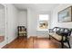 Inviting sitting area with hardwood floors, built-in window seating, and stylish decor at 1003 E Emma St, Tampa, FL 33603