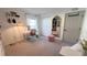 Bedroom featuring a vanity table, plush accents, and ample closet space at 10123 Carp Hollow Rd, Sun City Center, FL 33573