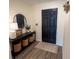 A beautifully decorated entryway with a black console table and accents at 10123 Carp Hollow Rd, Sun City Center, FL 33573