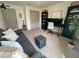 Home office featuring a desk, comfortable seating, and ample storage at 10123 Carp Hollow Rd, Sun City Center, FL 33573