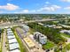 Aerial view of modern townhomes, showcasing their rooftop decks and proximity to city amenities at 10340 2Nd N Way, St Petersburg, FL 33716
