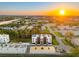 Aerial view of new townhome construction, highlighting the rooftop decks and neighborhood layout at 10340 2Nd N Way, St Petersburg, FL 33716