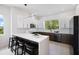 Bright kitchen with ample counter space, modern cabinetry, and stainless steel appliances at 10340 2Nd N Way, St Petersburg, FL 33716