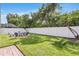 Well-maintained backyard with a cozy fire pit and ample space for relaxation and activities at 11324 Cypress Reserve Dr, Tampa, FL 33626