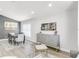 Bright dining room features recessed lighting, hardwood floors, and a decorative bar at 11324 Cypress Reserve Dr, Tampa, FL 33626