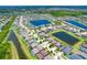 Expansive aerial shot of a community showcasing multiple ponds and green spaces, ideal for serene living at 11612 Sunburst Marble Rd, Riverview, FL 33579
