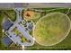 Birds eye view of park featuring playground, recreation field, restrooms, parking and sidewalks at 11612 Sunburst Marble Rd, Riverview, FL 33579