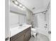 Clean bathroom featuring modern vanity, shower-tub combo, and updated fixtures at 11623 Tetrafin Dr, Riverview, FL 33579