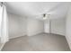 Spacious carpeted bedroom with ceiling fan and neutral walls offers a relaxing atmosphere at 11623 Tetrafin Dr, Riverview, FL 33579
