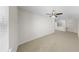 Large carpeted bonus room with ceiling fan provides flexible living space at 11623 Tetrafin Dr, Riverview, FL 33579