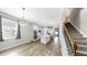 A spacious open concept kitchen with stainless steel appliances and stone countertops at 11623 Tetrafin Dr, Riverview, FL 33579