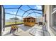 Covered patio area with gazebo and grill is perfect for entertaining and relaxing outdoors at 11623 Tetrafin Dr, Riverview, FL 33579