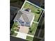 Overhead view of a home with a fenced-in yard, outdoor seating, and meticulous landscaping at 11726 Sunburst Marble Rd, Riverview, FL 33579