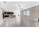 Bright and open floor plan featuring an island kitchen with granite countertops at 11726 Sunburst Marble Rd, Riverview, FL 33579