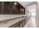 Kitchen featuring granite countertops, plenty of cabinets, and stainless steel appliances at 11726 Sunburst Marble Rd, Riverview, FL 33579
