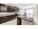 Beautiful kitchen with granite countertops, a center island, and stainless steel appliances at 11726 Sunburst Marble Rd, Riverview, FL 33579
