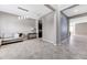 Open-concept living space featuring tile flooring, neutral paint, and stylish decor at 11726 Sunburst Marble Rd, Riverview, FL 33579