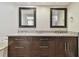 Large bathroom features a granite countertop with and sinks, alongside an adjacent soaking tub at 1175 San Carlos Ne Ave, St Petersburg, FL 33702