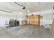 A spacious garage with washer, dryer, and ample room for parking and storage at 1175 San Carlos Ne Ave, St Petersburg, FL 33702
