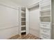 This organized walk-in closet includes shelving and drawers, maximizing storage space and functionality at 1175 San Carlos Ne Ave, St Petersburg, FL 33702