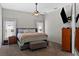 Comfortable bedroom with ceiling fan and ample natural light at 11927 Steppingstone Blvd, Tampa, FL 33635