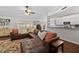 Inviting living room with hardwood floors and comfortable leather sofa at 11927 Steppingstone Blvd, Tampa, FL 33635