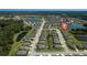 A stunning aerial view showcasing a Primary-planned community with ponds and lush landscaping at 12170 Gothic Rd, Spring Hill, FL 34610