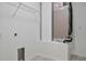 Neat utility room offering shelving and a sink, perfect for laundry needs at 12170 Gothic Rd, Spring Hill, FL 34610