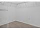 This walk-in closet features carpeted floors and wire shelving at 12170 Gothic Rd, Spring Hill, FL 34610