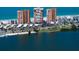Stunning aerial view of beachfront condos, marina, and waterfront properties for luxurious living at 17920 Gulf Blvd # 1901, Redington Shores, FL 33708