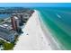 Breathtaking aerial view of the coastline, showcasing the building's oceanfront location and pristine beach at 17920 Gulf Blvd # 1901, Redington Shores, FL 33708