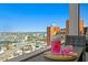 Enjoy a refreshing drink on the balcony with stunning city views at 17920 Gulf Blvd # 1901, Redington Shores, FL 33708