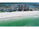 Aerial view showcases the beautiful beach near beachfront condo complex, perfect for seaside enjoyment at 17920 Gulf Blvd # 1901, Redington Shores, FL 33708