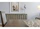 Dining room with wood table, chair set, wood floors, decorative accents and beach themed art at 17920 Gulf Blvd # 1901, Redington Shores, FL 33708