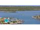 Scenic waterfront view showcasing the coastline, tranquil waters, and charming coastal homes at 17920 Gulf Blvd # 1901, Redington Shores, FL 33708