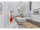 Modern bathroom featuring double sinks, a large mirror, and stylish lighting fixtures at 213 N Hesperides St, Tampa, FL 33609