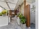 Gourmet outdoor kitchen with marble countertops, modern appliances, and indoor/outdoor shower enhance this living space at 213 N Hesperides St, Tampa, FL 33609