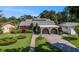 Charming single-Gathering home with a manicured lawn and a two-car attached garage at 2134 Serpentine S Cir, St Petersburg, FL 33712