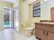 Bathroom with tile floors, sliding glass shower door, and view of the pool at 2217 High Point Dr, Brandon, FL 33511