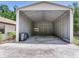 Spacious metal storage building next to house and garage at 2217 High Point Dr, Brandon, FL 33511