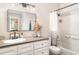 Bathroom featuring a vanity with modern fixtures, and a shower-tub combo at 2403 Nantucket Field Way # 27, Sun City Center, FL 33573
