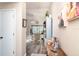 Open foyer showcasing hardwood floors and a glimpse of the living room at 2403 Nantucket Field Way # 27, Sun City Center, FL 33573