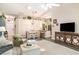 Spacious living room offering hardwood floors and an open floor plan at 2403 Nantucket Field Way # 27, Sun City Center, FL 33573