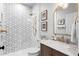 Bathroom featuring a stylish shower and vanity at 2403 W Sunset Dr, Tampa, FL 33629