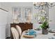 Elegant dining room featuring stylish decor and a tablescape with an orchid centerpiece at 2403 W Sunset Dr, Tampa, FL 33629