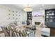Stylish living room featuring a fireplace, built-in shelving, and comfortable seating at 2403 W Sunset Dr, Tampa, FL 33629