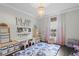 Playroom with 'PLAY' sign, storage and natural light at 2403 W Sunset Dr, Tampa, FL 33629
