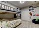 Spacious ' bedroom featuring a bunk bed, carpet flooring, and themed decorations at 2456 Arbor Wind Dr, Lutz, FL 33558