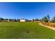 Large green field of artificial turf in the community is great for activities and recreation at 2456 Arbor Wind Dr, Lutz, FL 33558